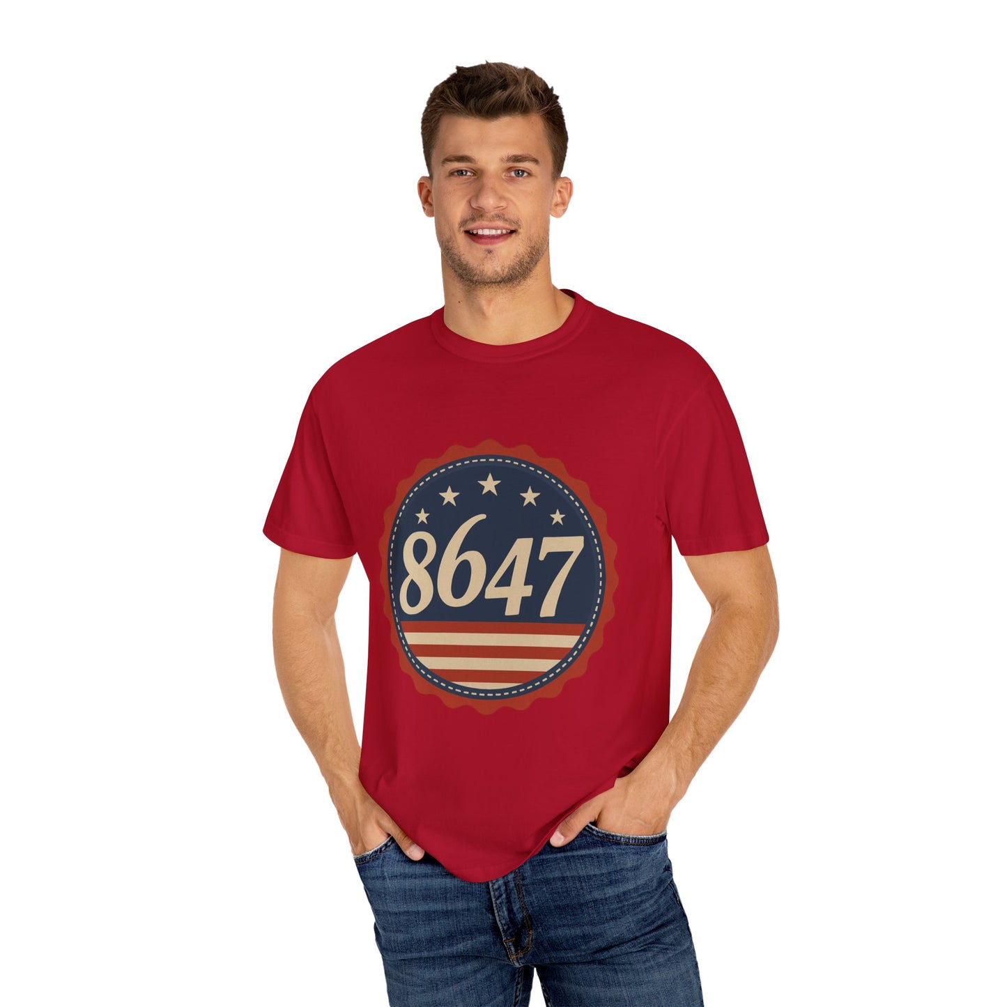 8647 DJT He's Gotta Go Unisex Garment-Dyed Tee. Large front logo design