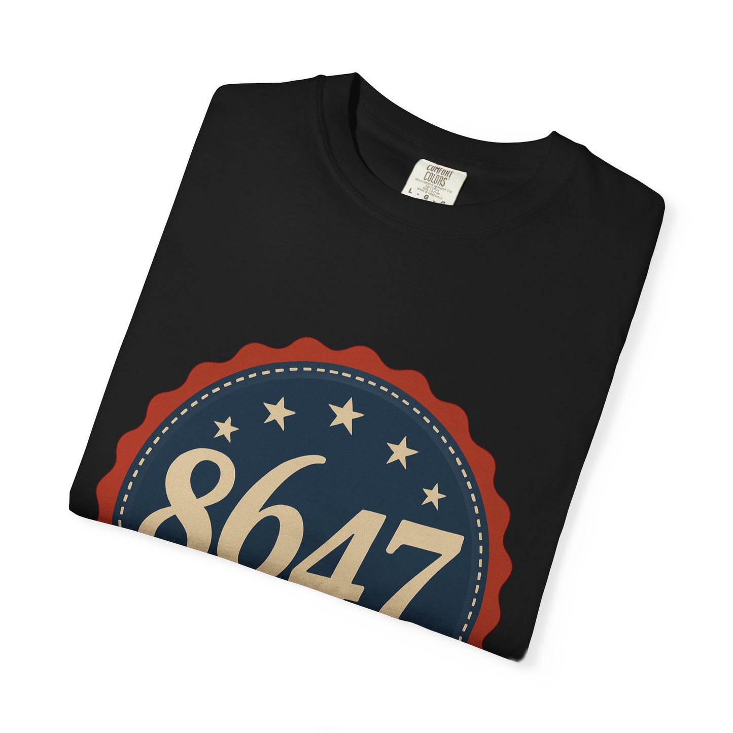 8647 DJT He's Gotta Go Unisex Garment-Dyed Tee. Large front logo design